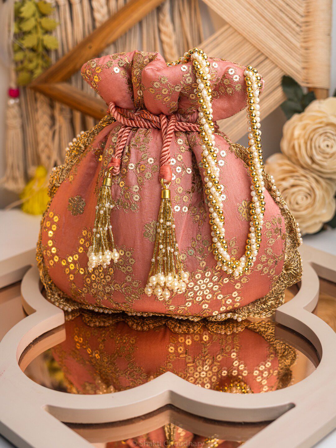 Dhiyona NR Women Pink Embroidered Potli Clutch