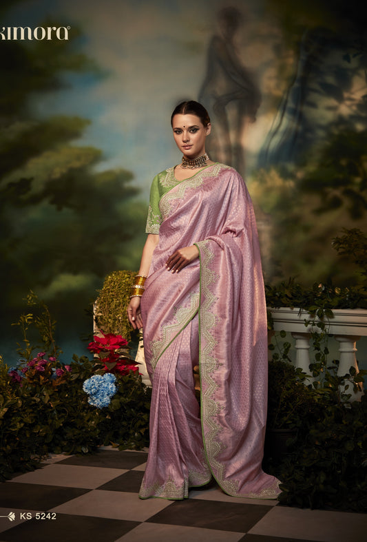 Dhiyona KM Women Pink Silk Saree With Contrasting Green Blouse