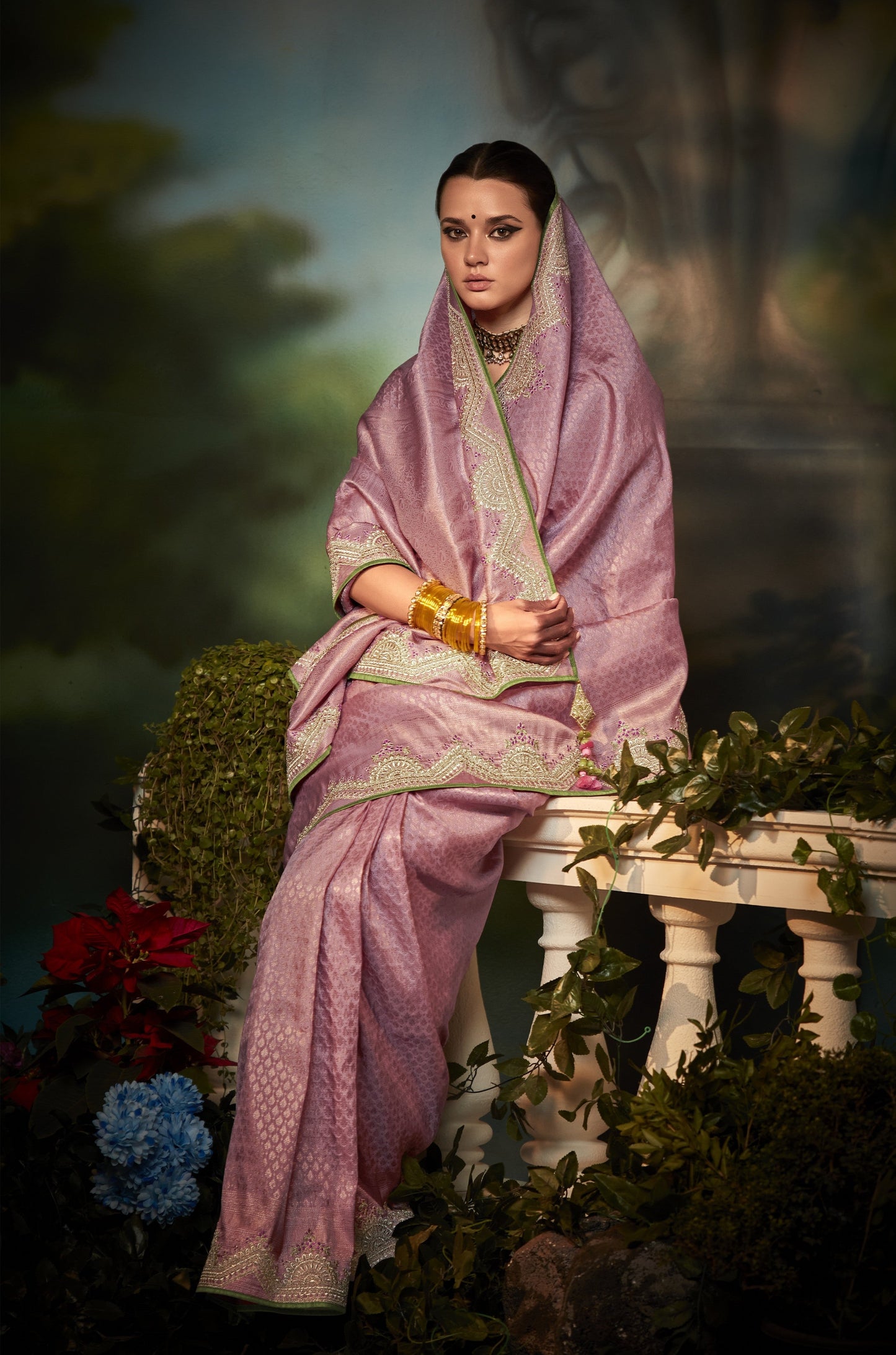 Dhiyona KM Women Pink Silk Saree With Contrasting Green Blouse