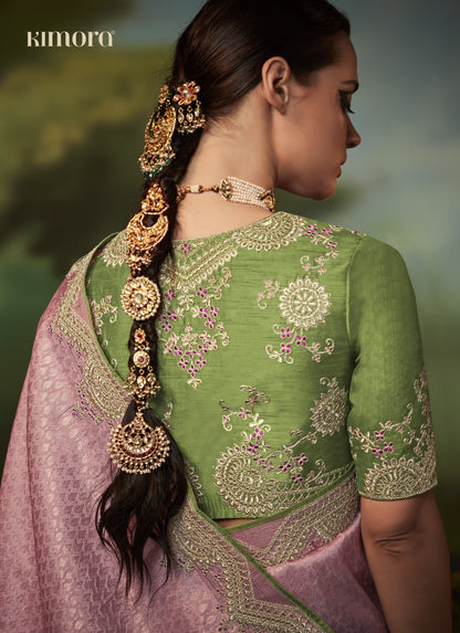 Dhiyona KM Women Pink Silk Saree With Contrasting Green Blouse