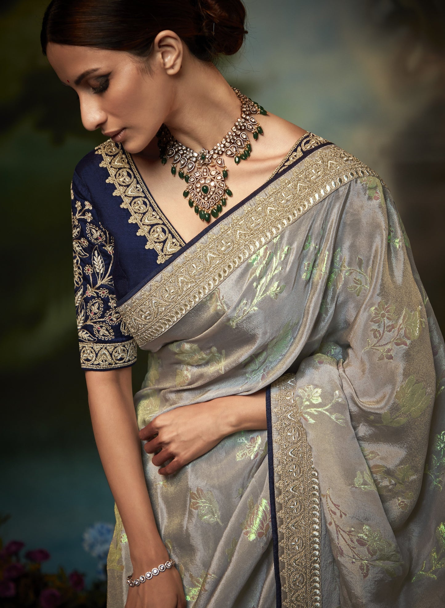Dhiyona KM Women Pastel Grey Silk Saree With Floral Zari Work And Royal Blue Embroidered Blouse “ Kimora