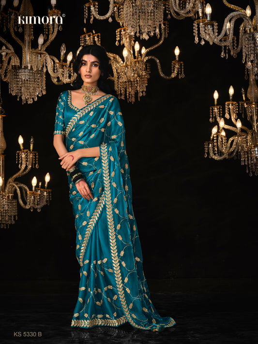 Dhiyona KM Women Queen Of The Twilight “ Peacock Blue Silk Saree