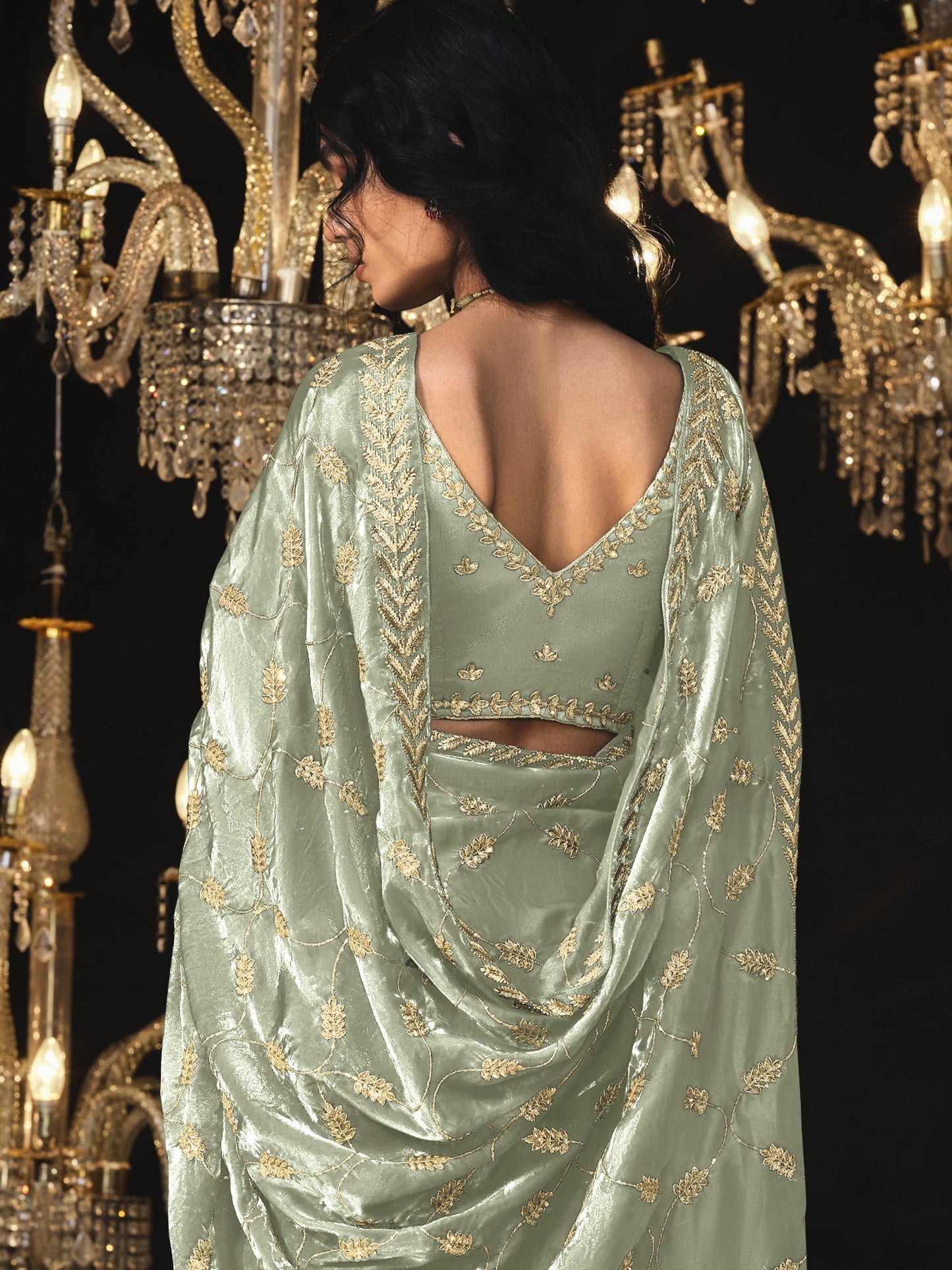 Dhiyona KM Women Olive Green Saree With Elegant Silver Embroidery