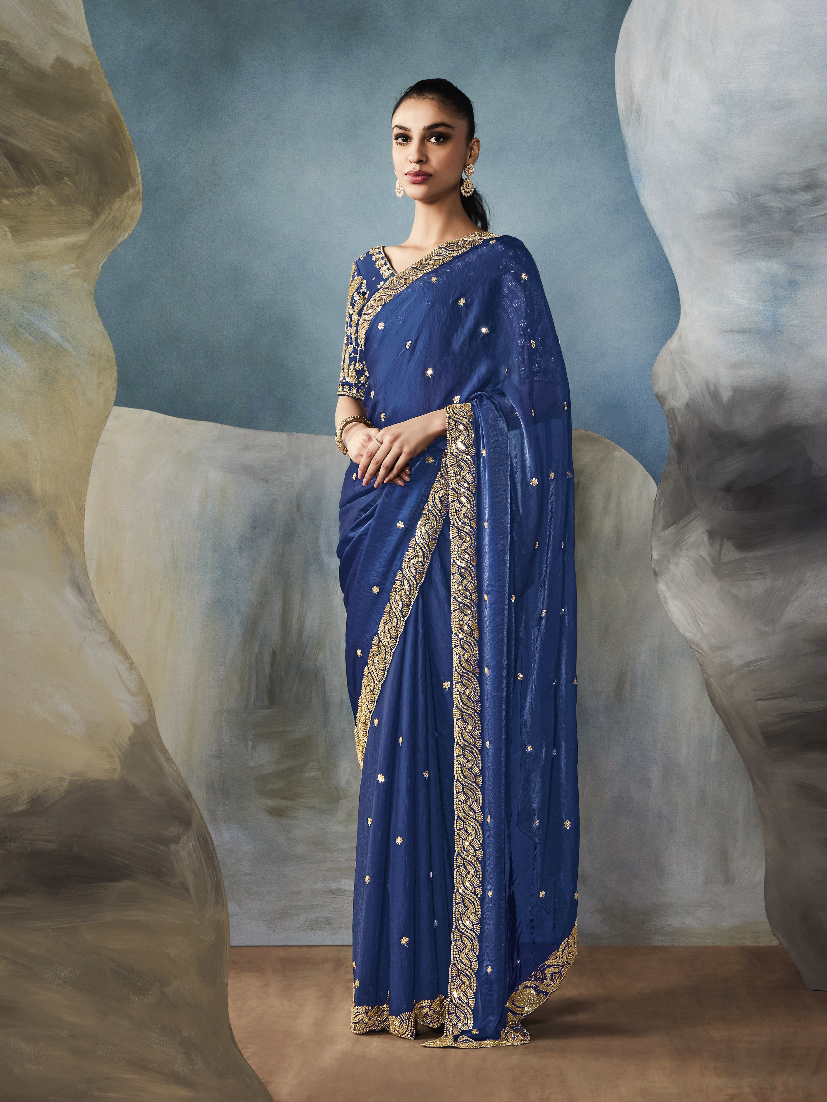 Dhiyona KM Women Navy Blue Tissue Embroidered Fancy Heavy Border Saree
