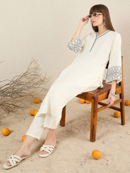 Women Solid Embroidered Kurta with Trousers