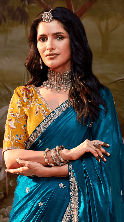 Dhiyona KM Women The Peacock Blue Tissue Silk Saree