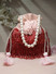 Dhiyona NR Embellished Tasselled Potli Clutch