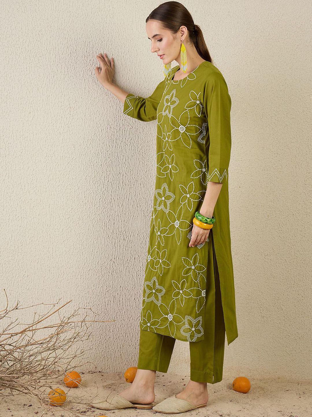 Women Floral Embroidered Cotton Kurta with Trousers