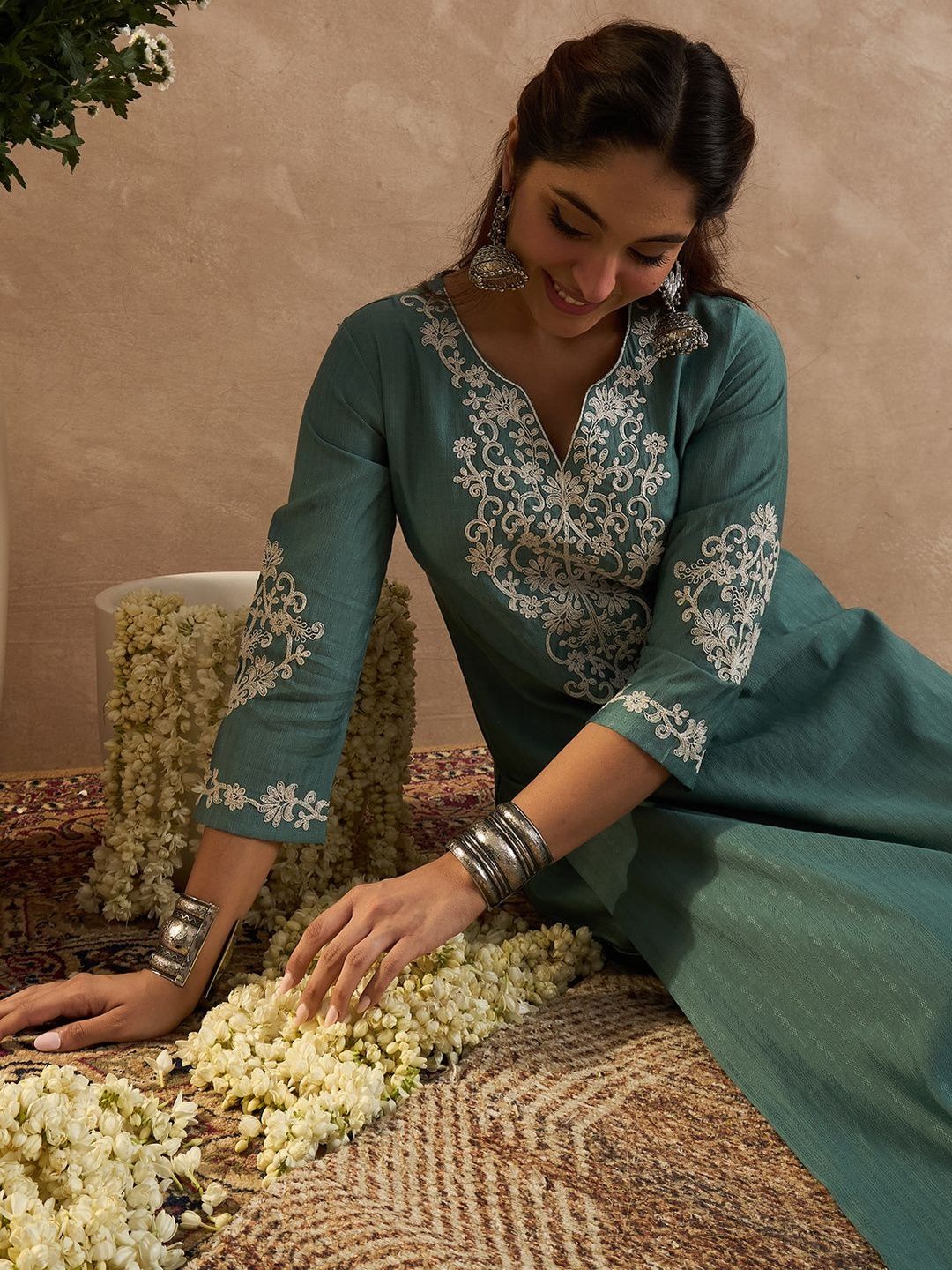 Women Ethnic Motifs Embroidered Regular Thread Work Kurta with Trousers