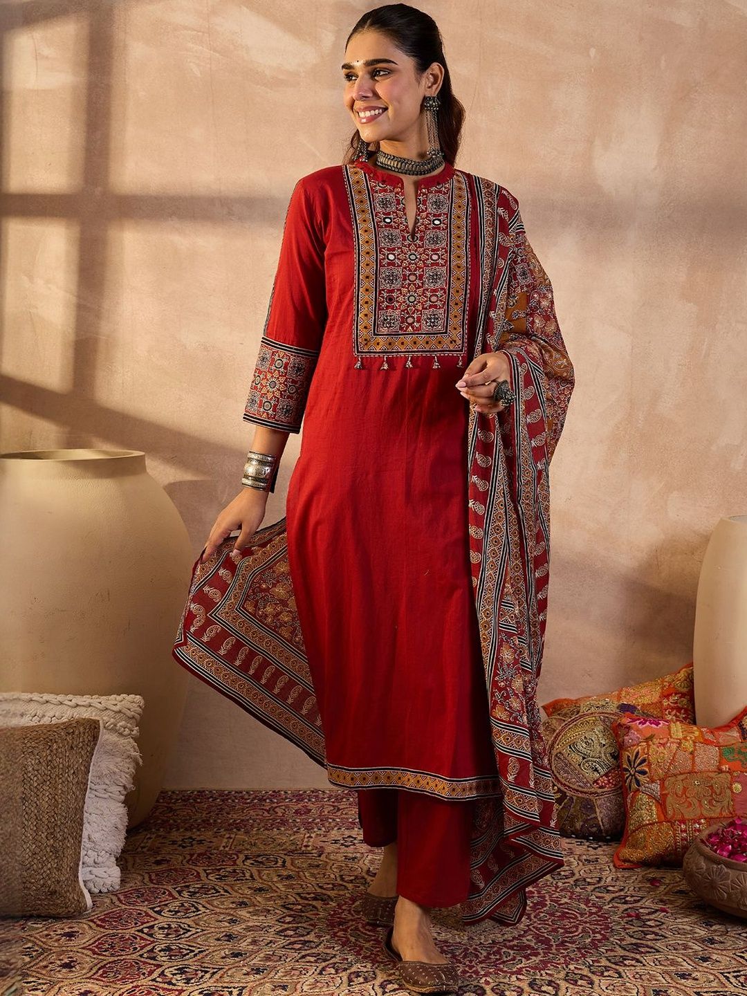 Women Ethnic Motifs Embroidered Cotton Kurta with Trousers