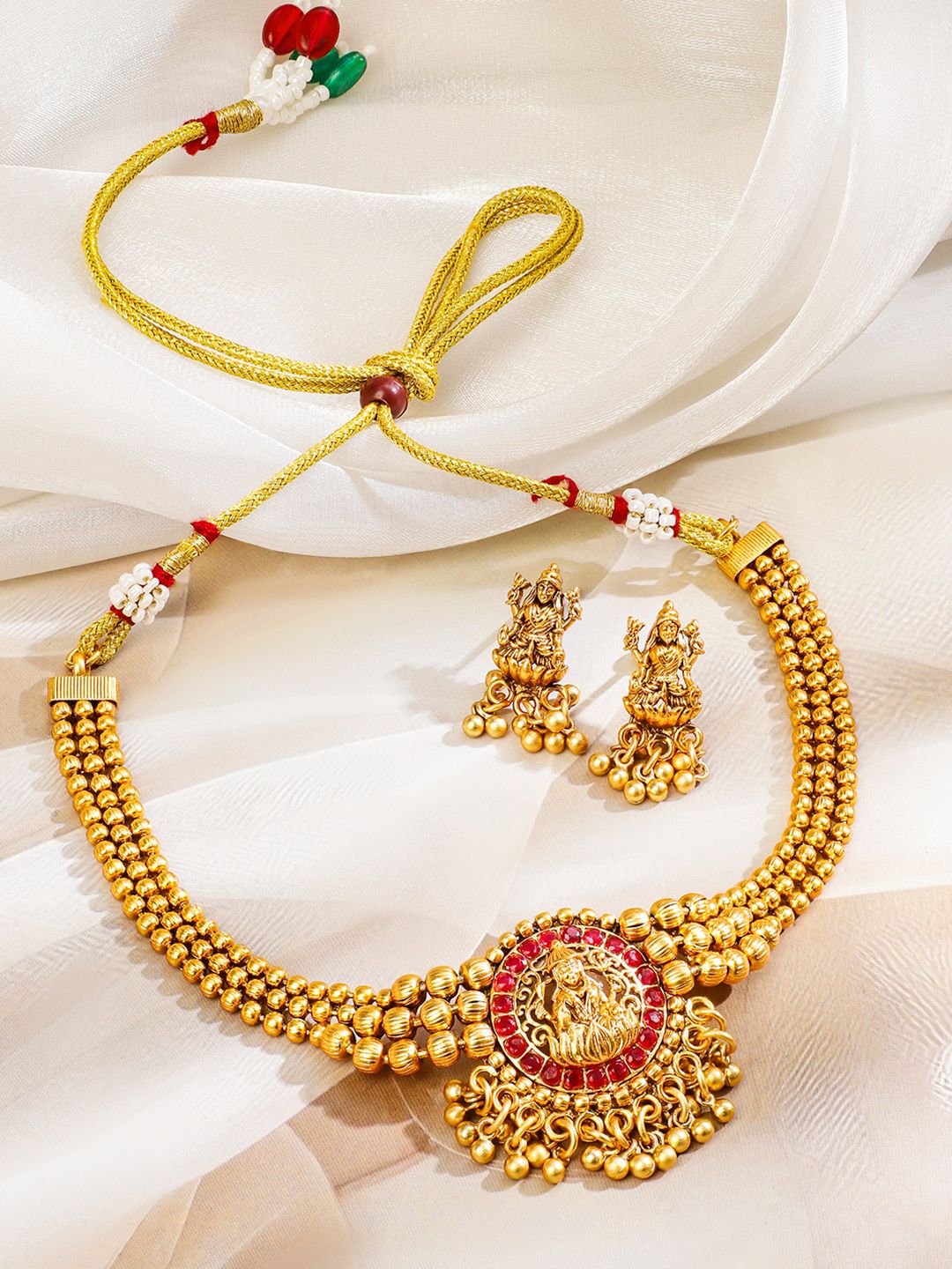 Dhiyona RJ Women's 22K Gold Plated Ruby Studded Gold Beaded Goddess Laxmi Motif Temple Jewellery Set