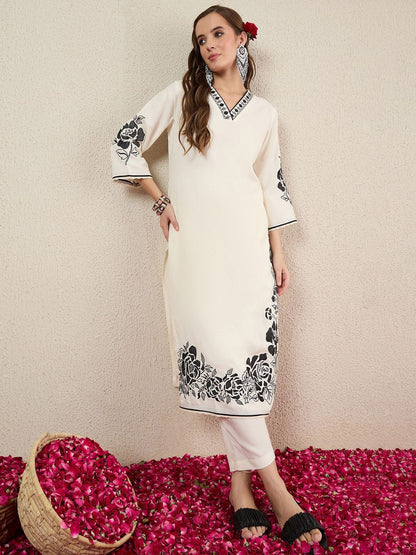 Women Solid Embroidered Kurta with Trousers