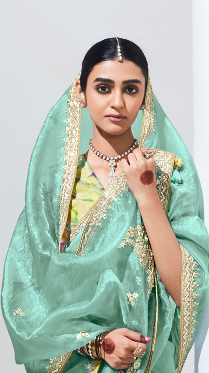 Dhiyona KM Women Elegant Green Organza Saree With Crushed Texture