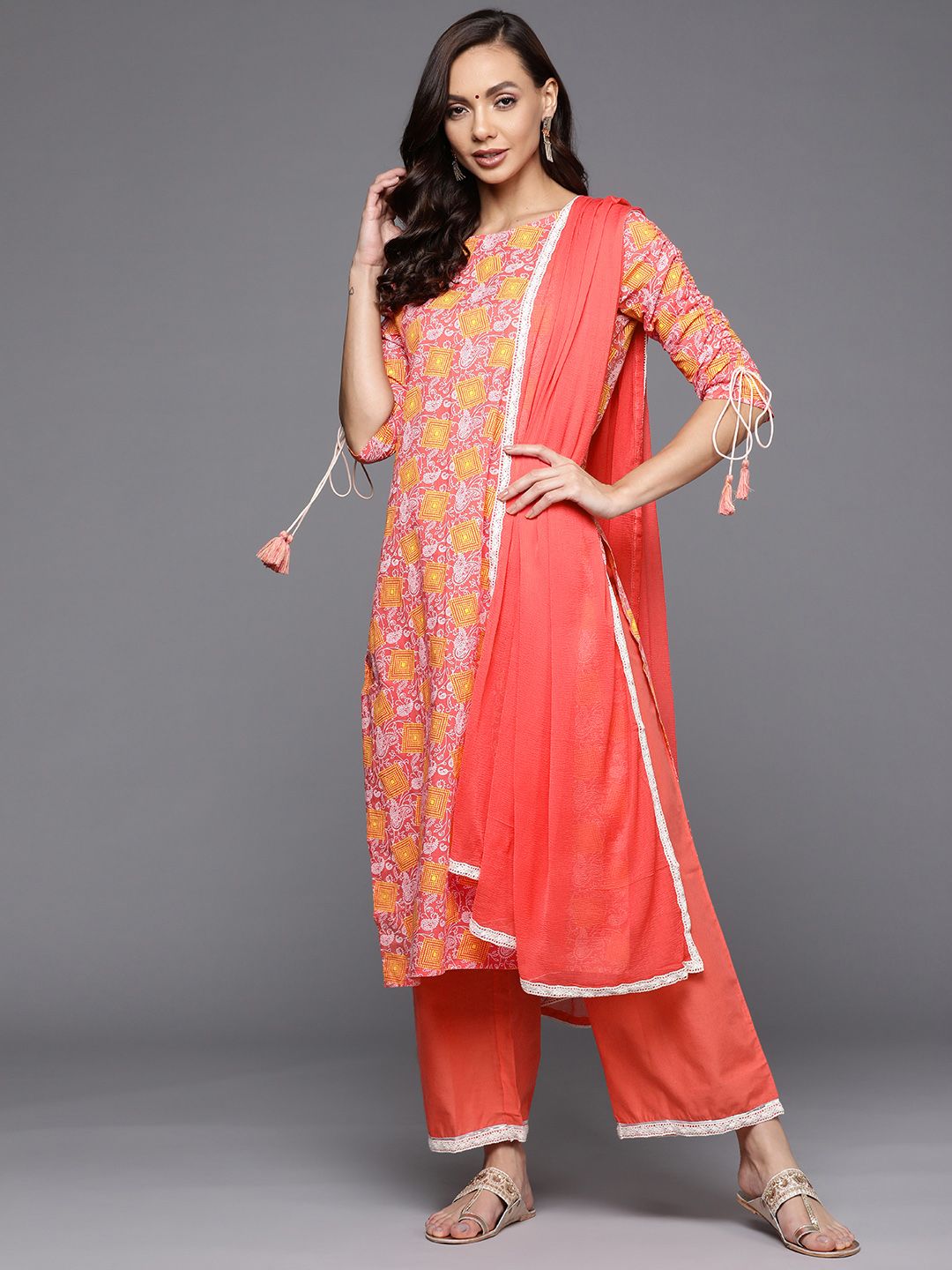 Women Coral Red Ethnic Motifs Printed Kurta with Trousers & With Dupatta