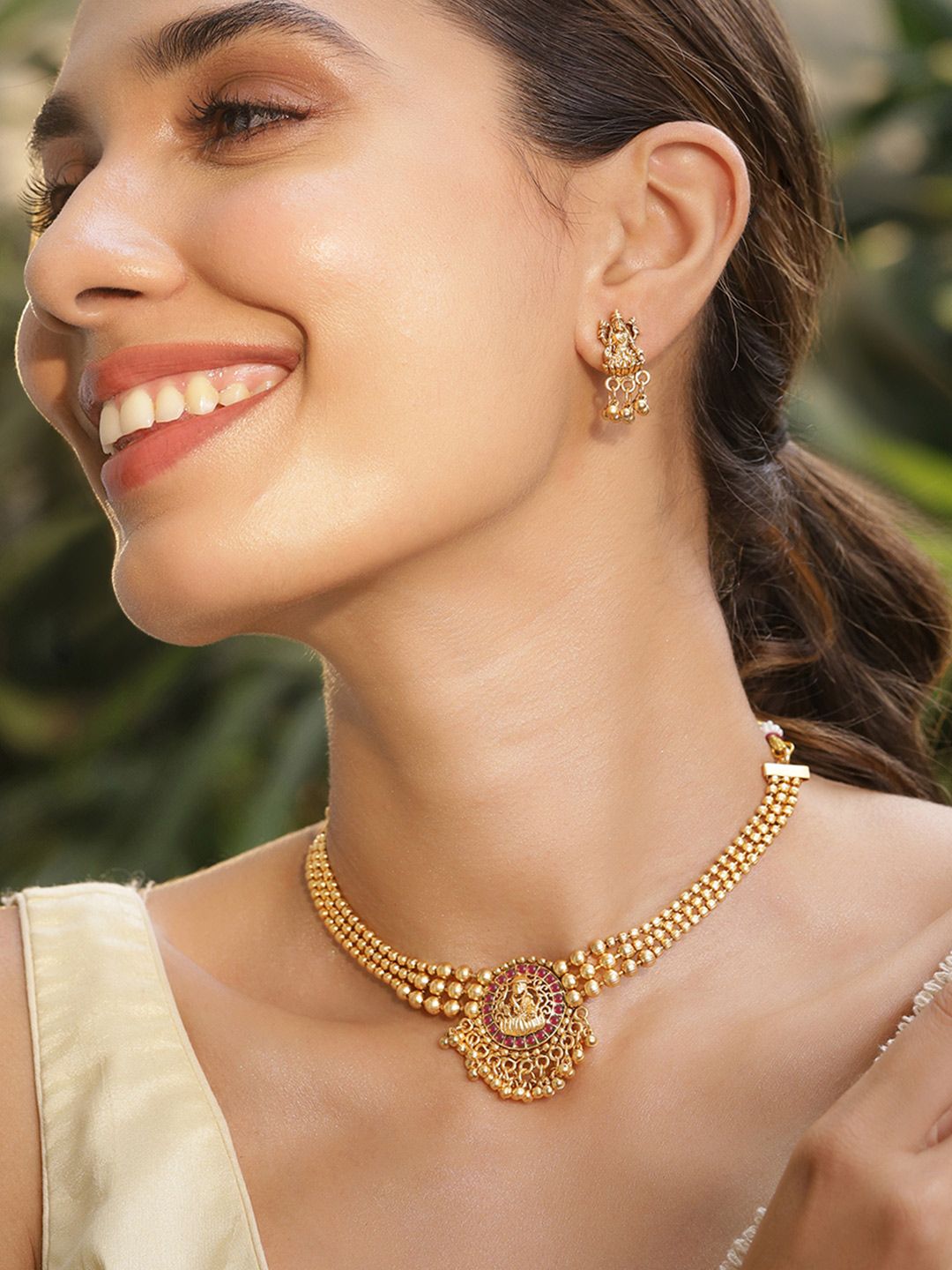 Dhiyona RJ Women's 22K Gold Plated Ruby Studded Gold Beaded Goddess Laxmi Motif Temple Jewellery Set