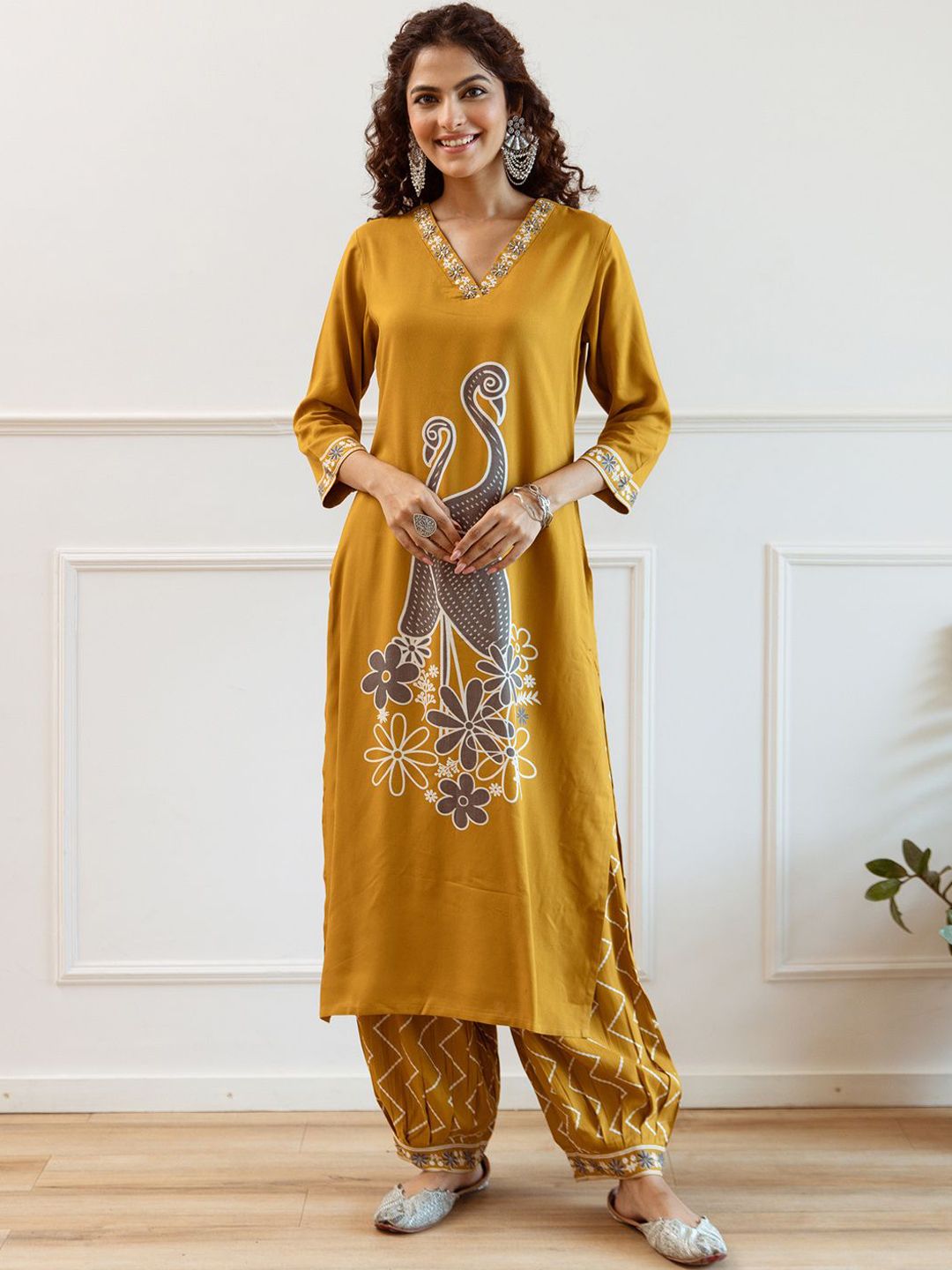 Women Embroidered Regular Beads and Stones Kurta with Trousers