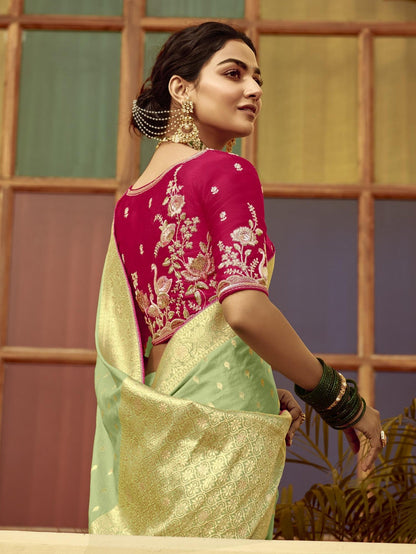Dhiyona KM Women Ethereal Mint Green Silk Saree “ A Graceful Heritage