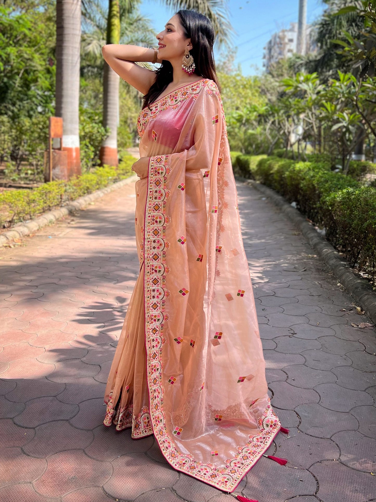 Women's Tissue Peach Embellished Designer Saree With Blouse Piece