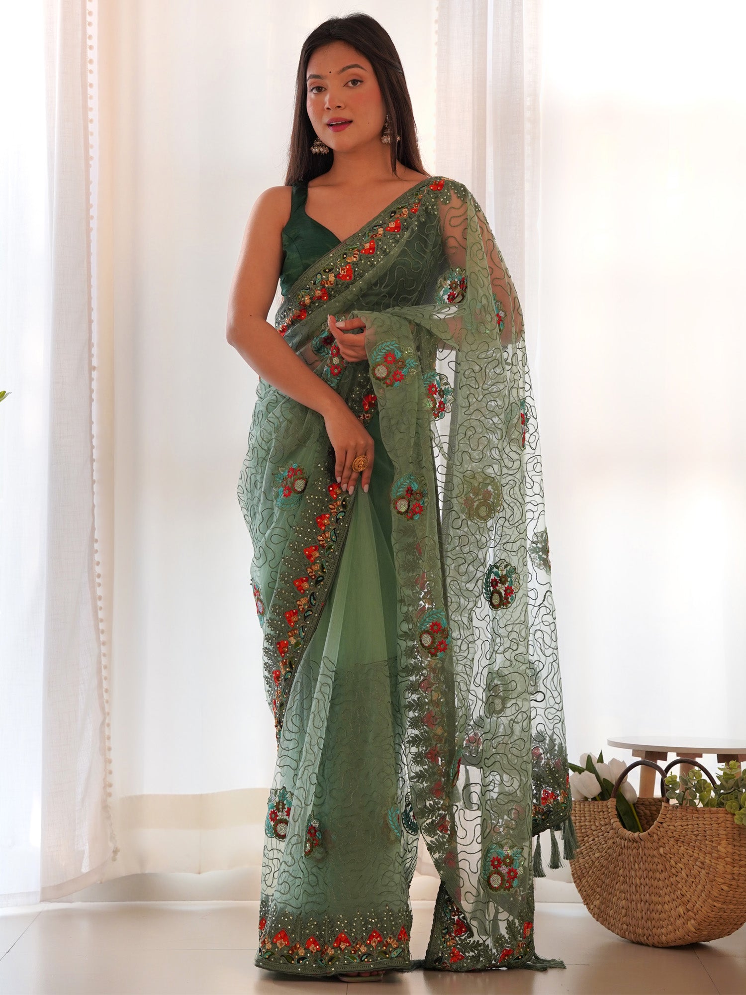 Women's Net Light Green Embellished Designer Saree With Blouse Piece