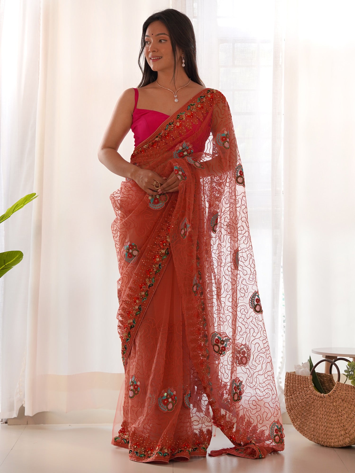 Women's Net Orange Embellished Designer Saree With Blouse Piece