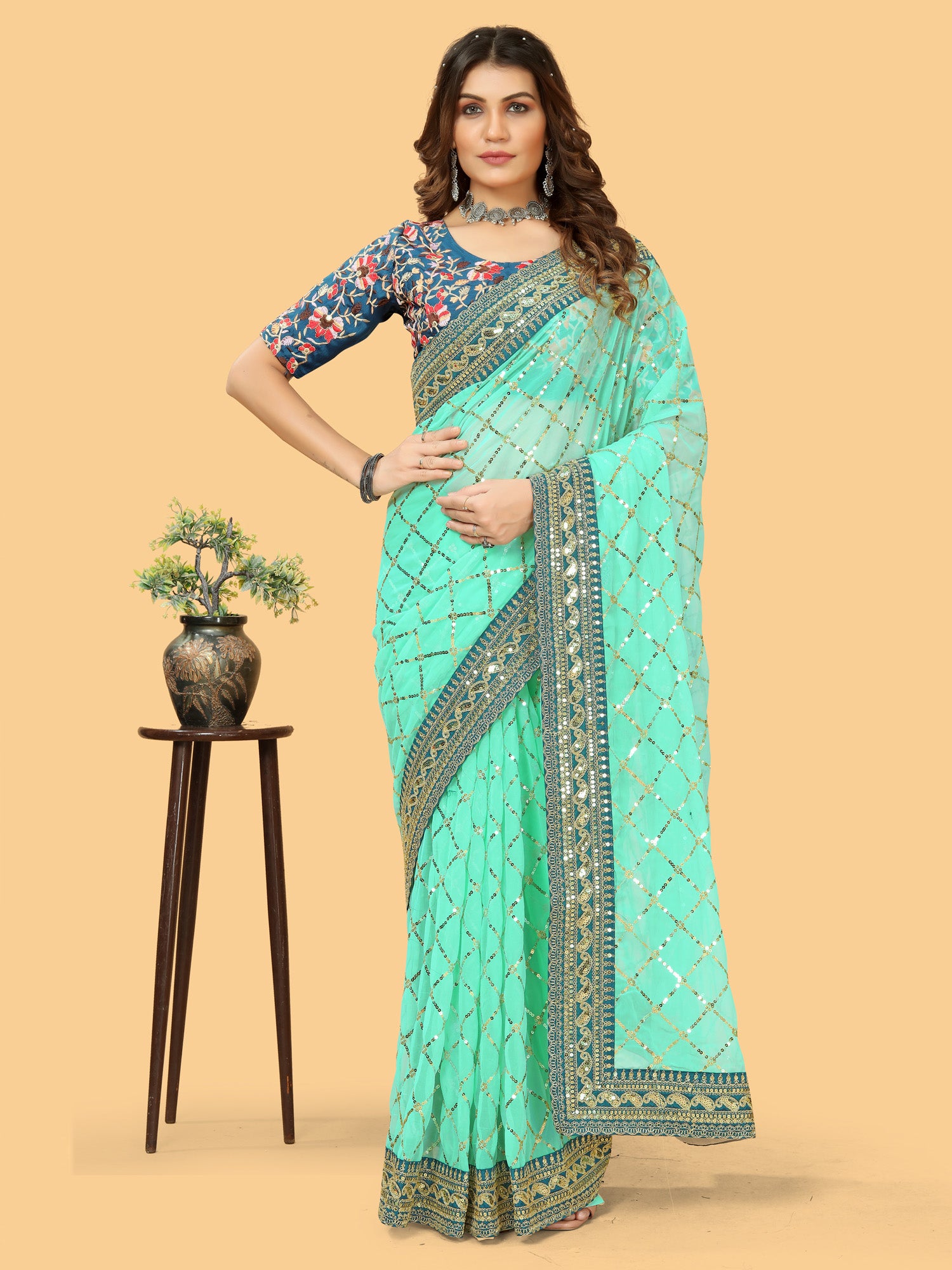 Women's Georgette Turquoise Embellished Designer Saree With Blouse Piece