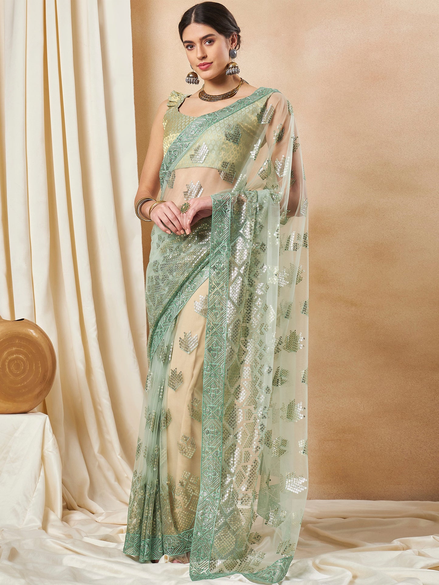 Women's Net Light Green Embellished Designer Saree With Blouse Piece