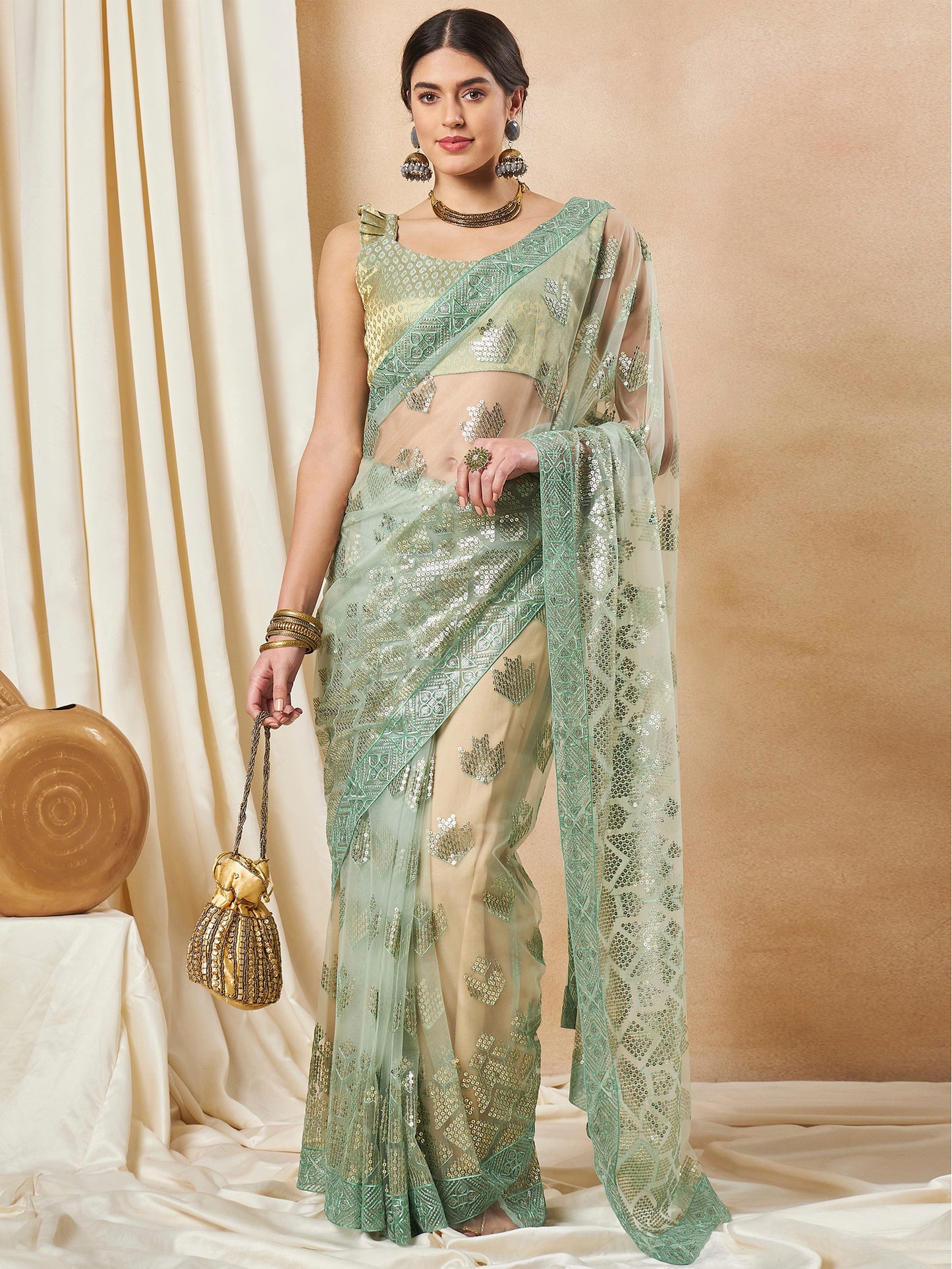 Women's Net Light Green Embellished Designer Saree With Blouse Piece