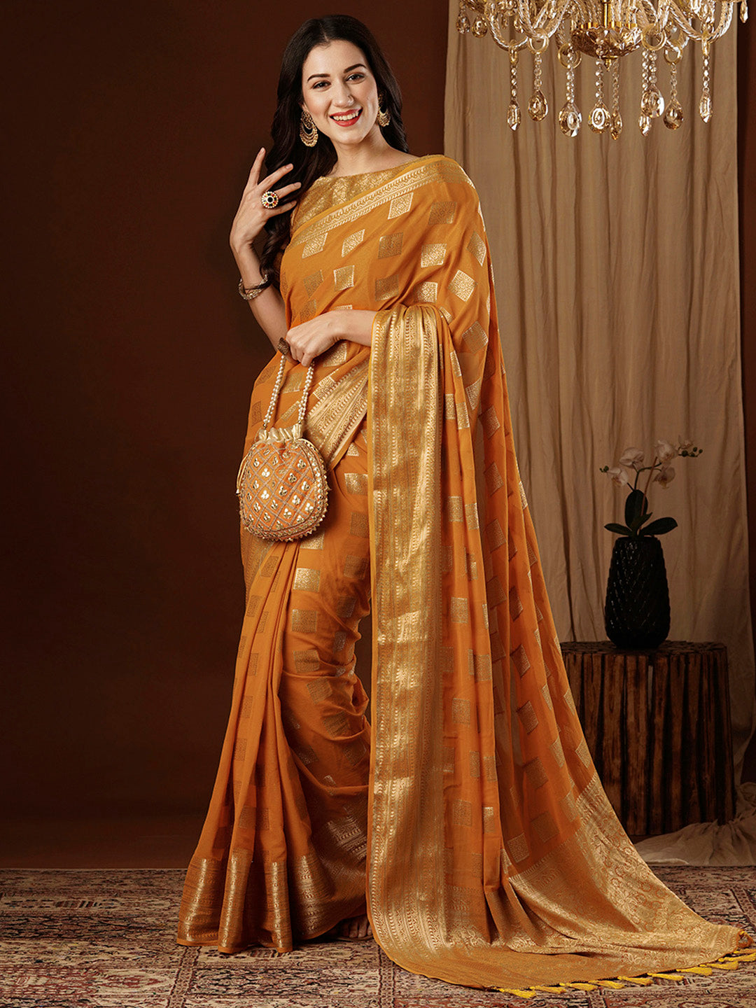 Women's Georgette Orange Woven Design Designer Saree With Blouse Piece