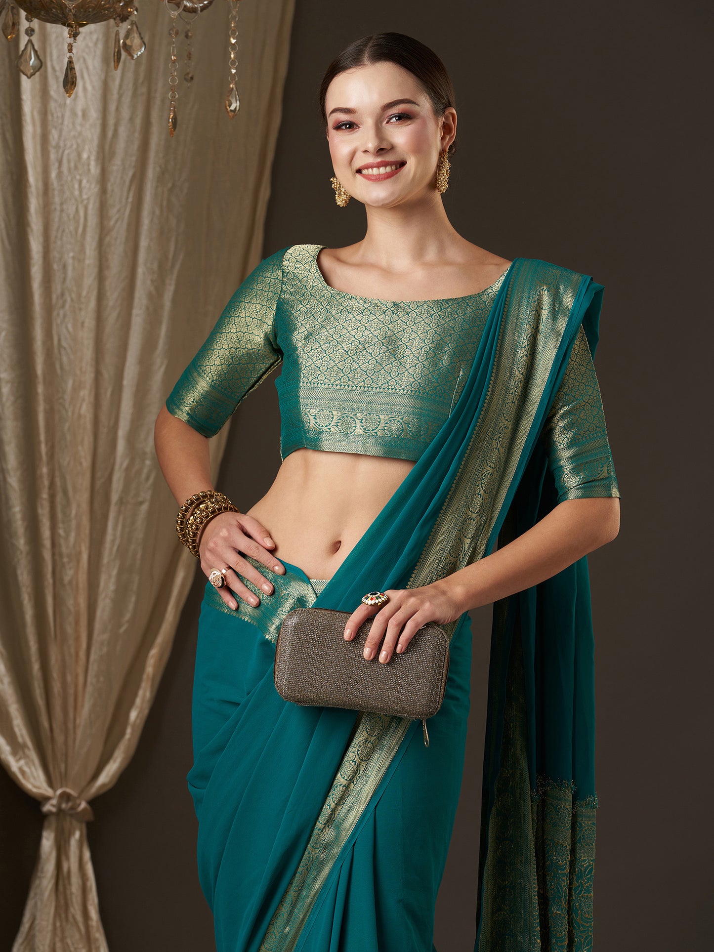 Women's Georgette Blue Woven Design Designer Saree With Blouse Piece