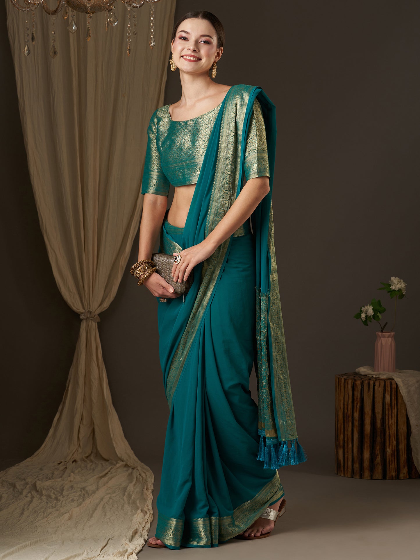 Women's Georgette Blue Woven Design Designer Saree With Blouse Piece