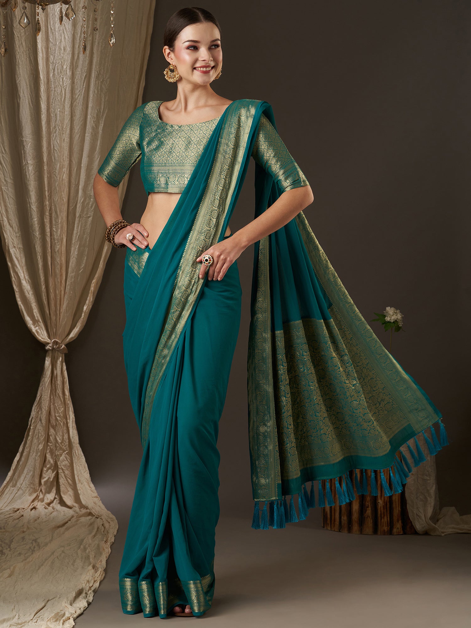 Women's Georgette Blue Woven Design Designer Saree With Blouse Piece