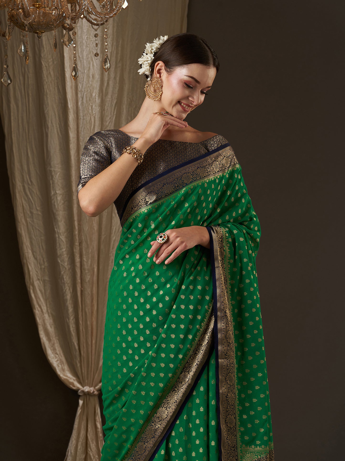 Women's Georgette Green Woven Design Designer Saree With Blouse Piece
