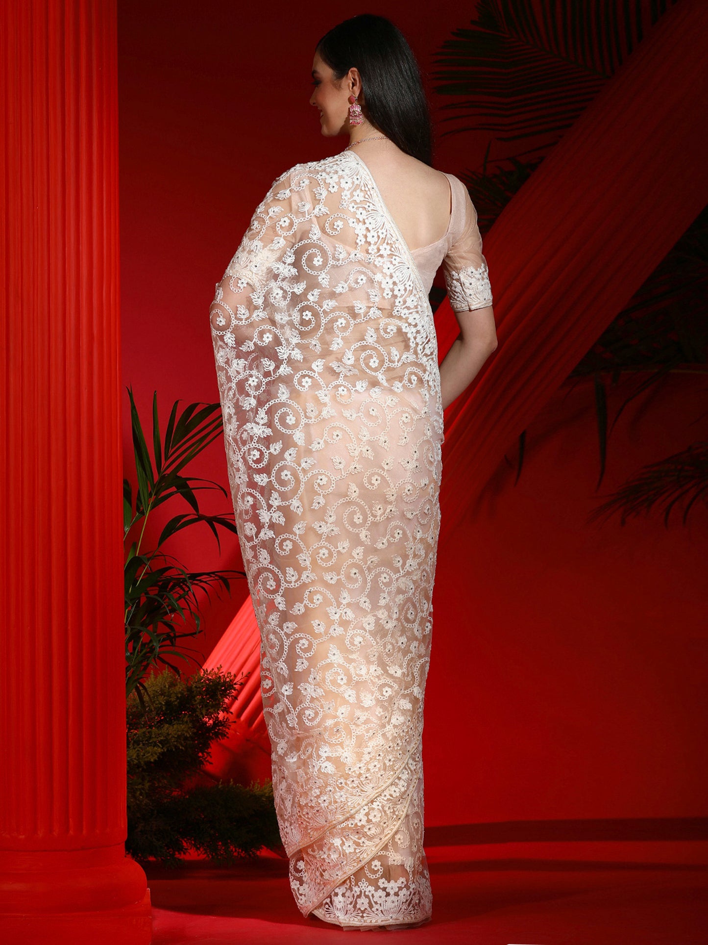 Women's Net Peach Embellished Designer Saree With Blouse Piece