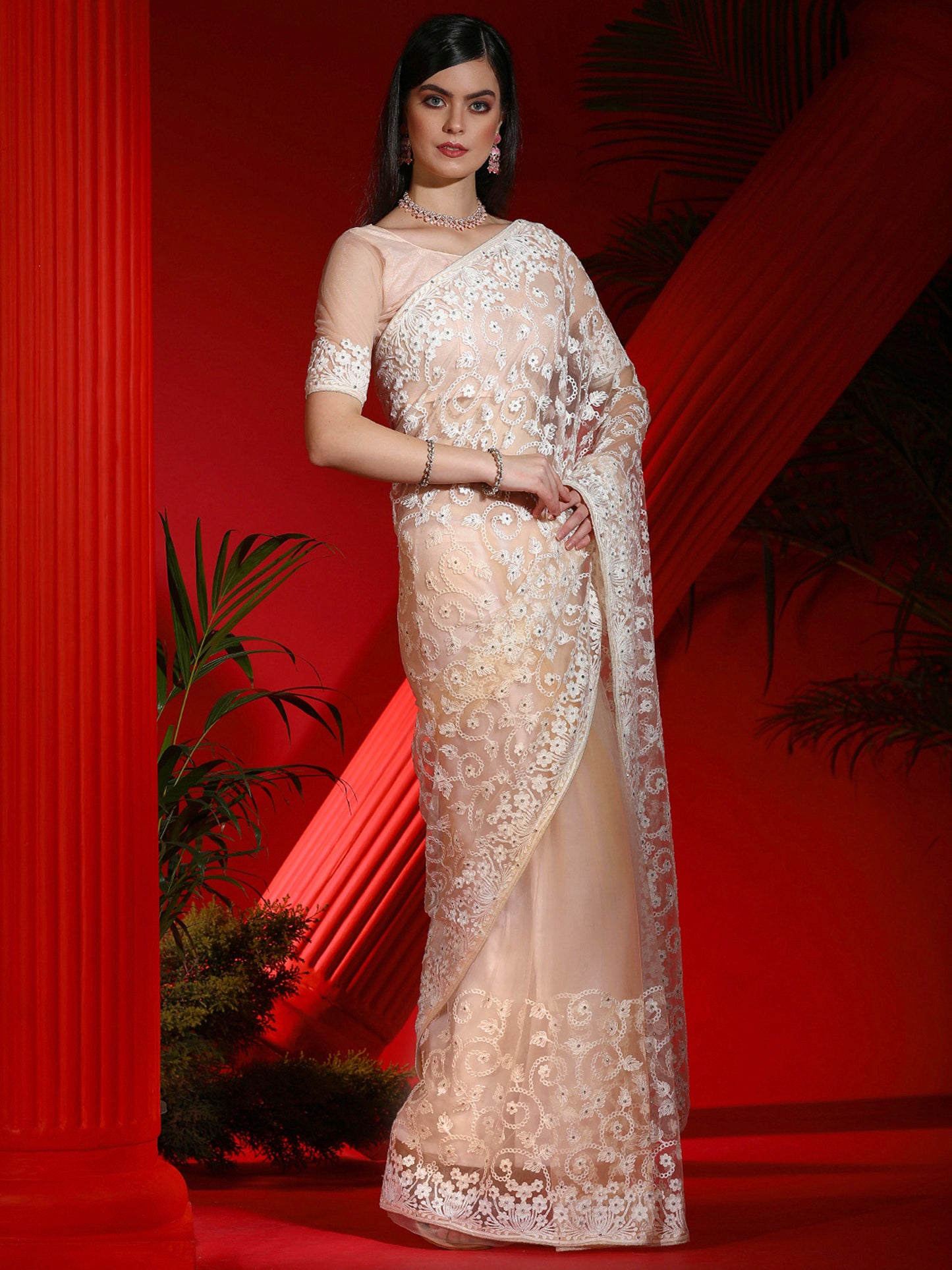 Women's Net Peach Embellished Designer Saree With Blouse Piece