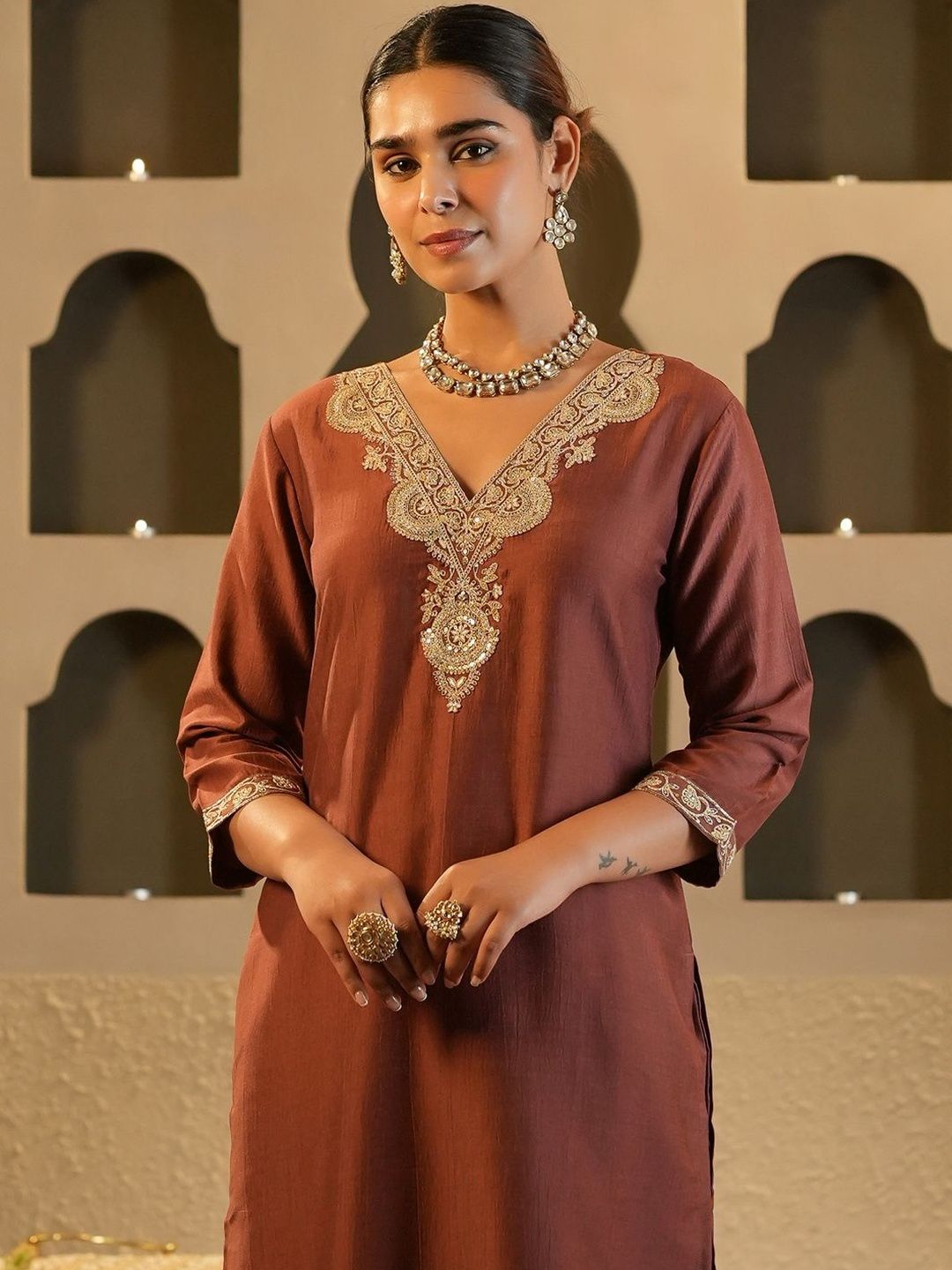 Women Solid Embroidered Kurta with Trousers