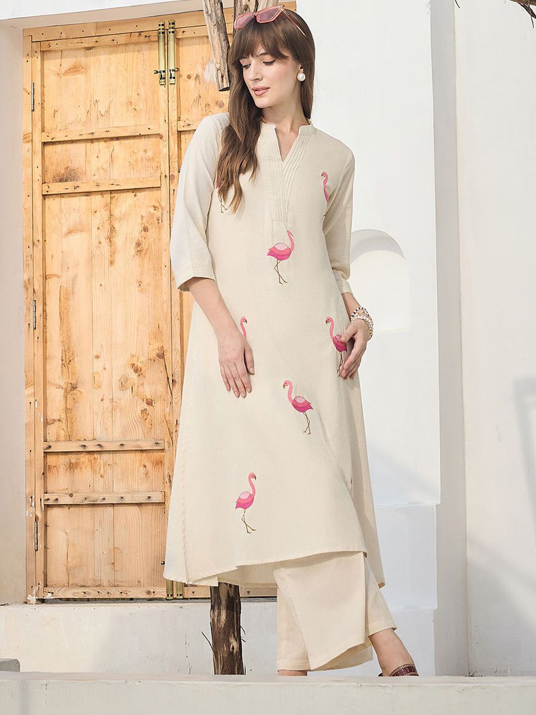 Women Animal Printed Cotton Kurta with Palazzos
