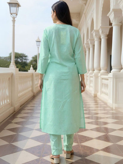 Women Floral Embroidered Cotton Kurta with Trousers