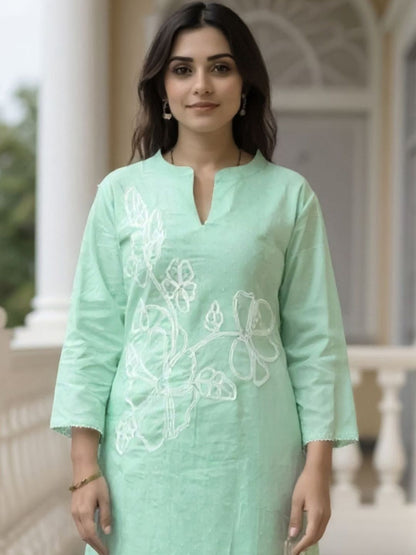 Women Floral Embroidered Cotton Kurta with Trousers