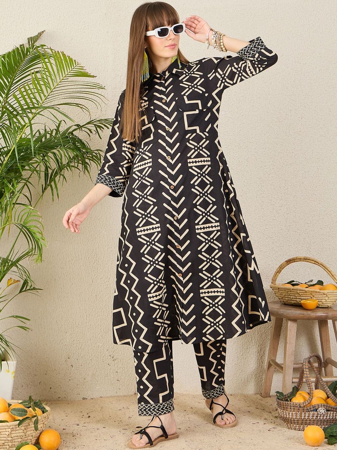 Women Geometric Printed Cotton A-Line Kurta with Trousers