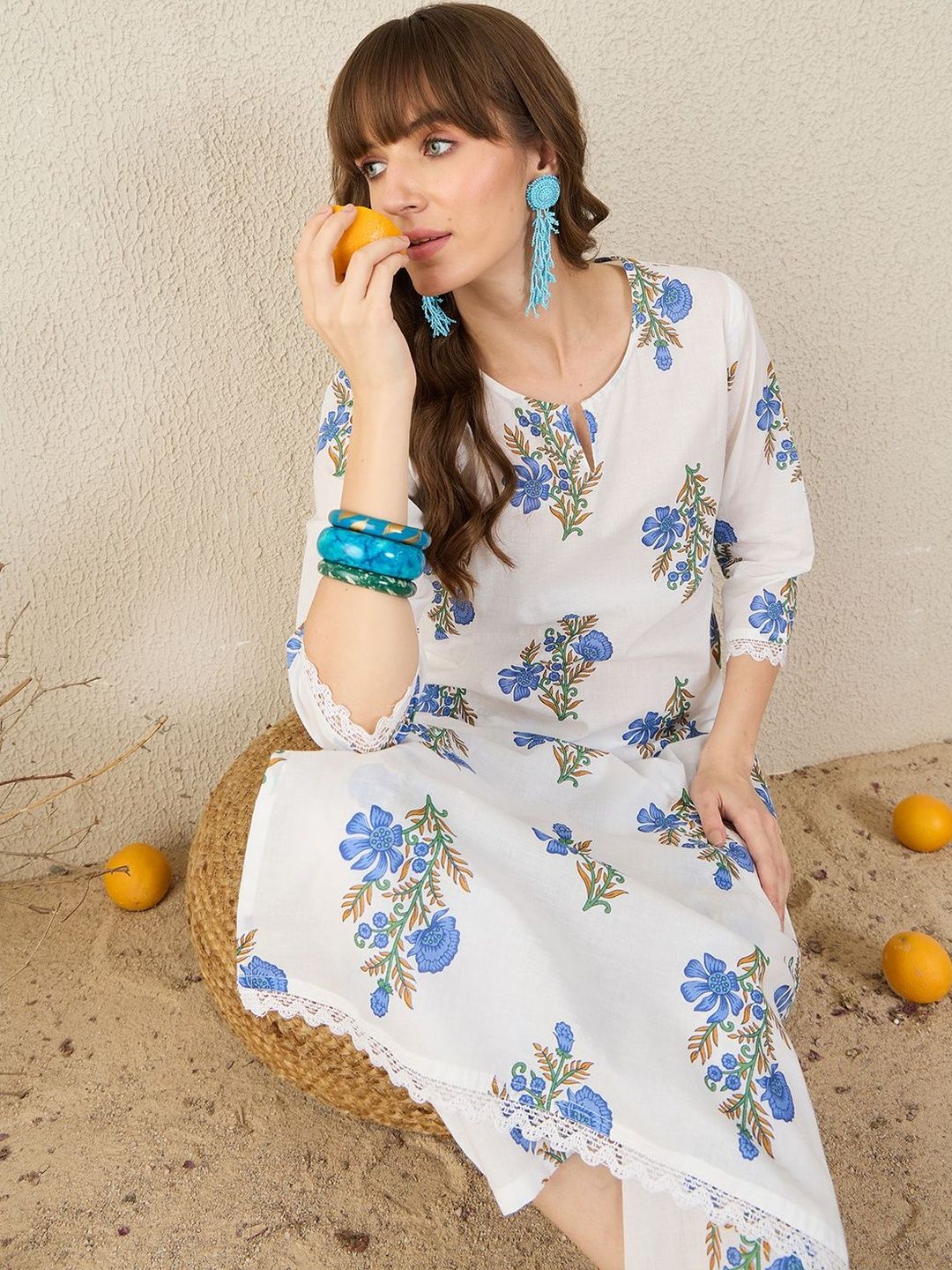 Women Floral Printed Cotton Kurta with Trousers