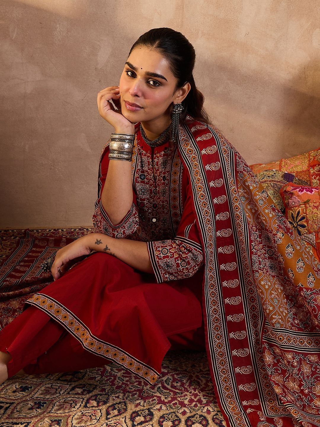 Women Ethnic Motifs Embroidered Cotton Kurta with Trousers