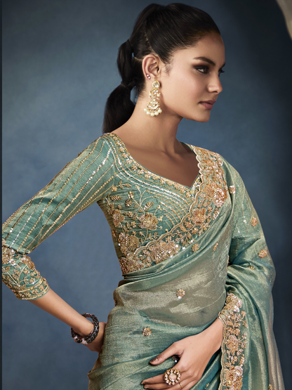 Dhiyona KM Women Sea Green Tissue Embroidered Fancy Heavy Border Saree