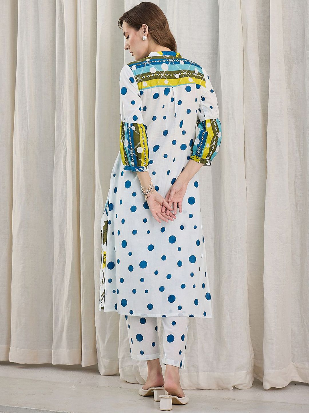 Women Floral Printed Cotton Kurta with Trousers