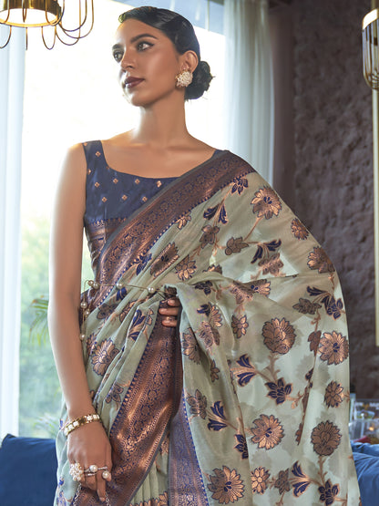 Women's Organza Turquoise Woven Design Designer Saree With Blouse Piece