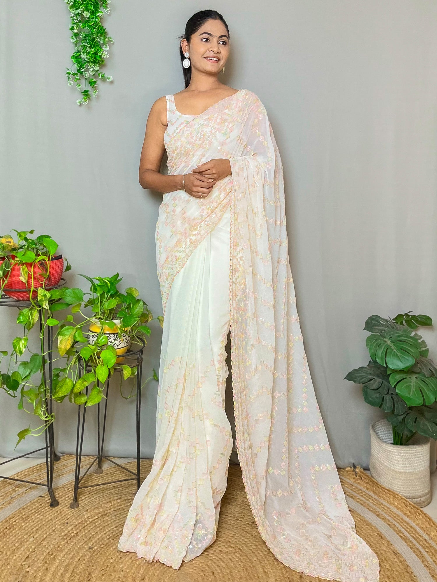 Women's Georgette Cream Embellished Designer Saree With Blouse Piece