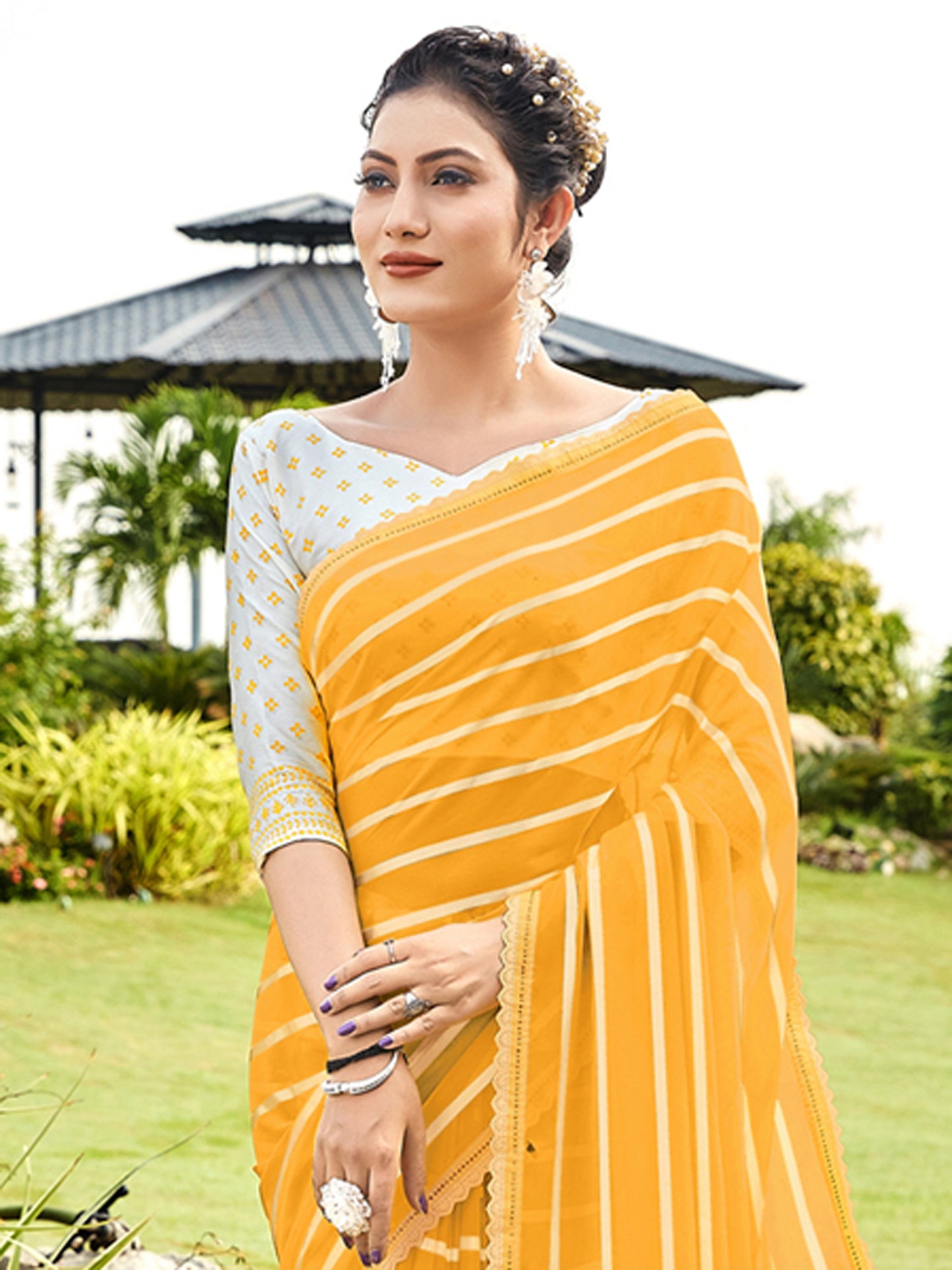 Women's Georgette Yellow Embellished Designer Saree With Blouse Piece
