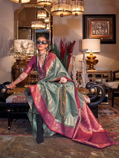 Women's Tissue Pink Woven Design Designer Saree With Blouse Piece