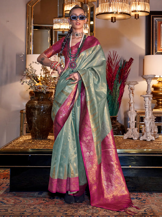 Women's Tissue Pink Woven Design Designer Saree With Blouse Piece