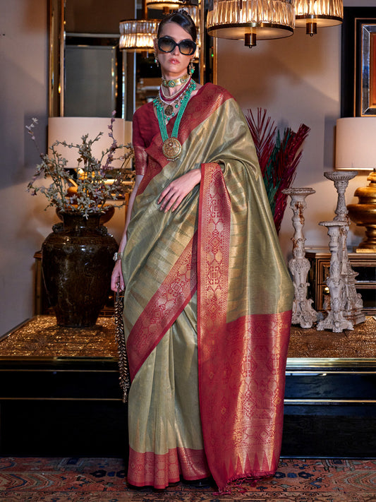 Women's Tissue Maroon Woven Design Designer Saree With Blouse Piece