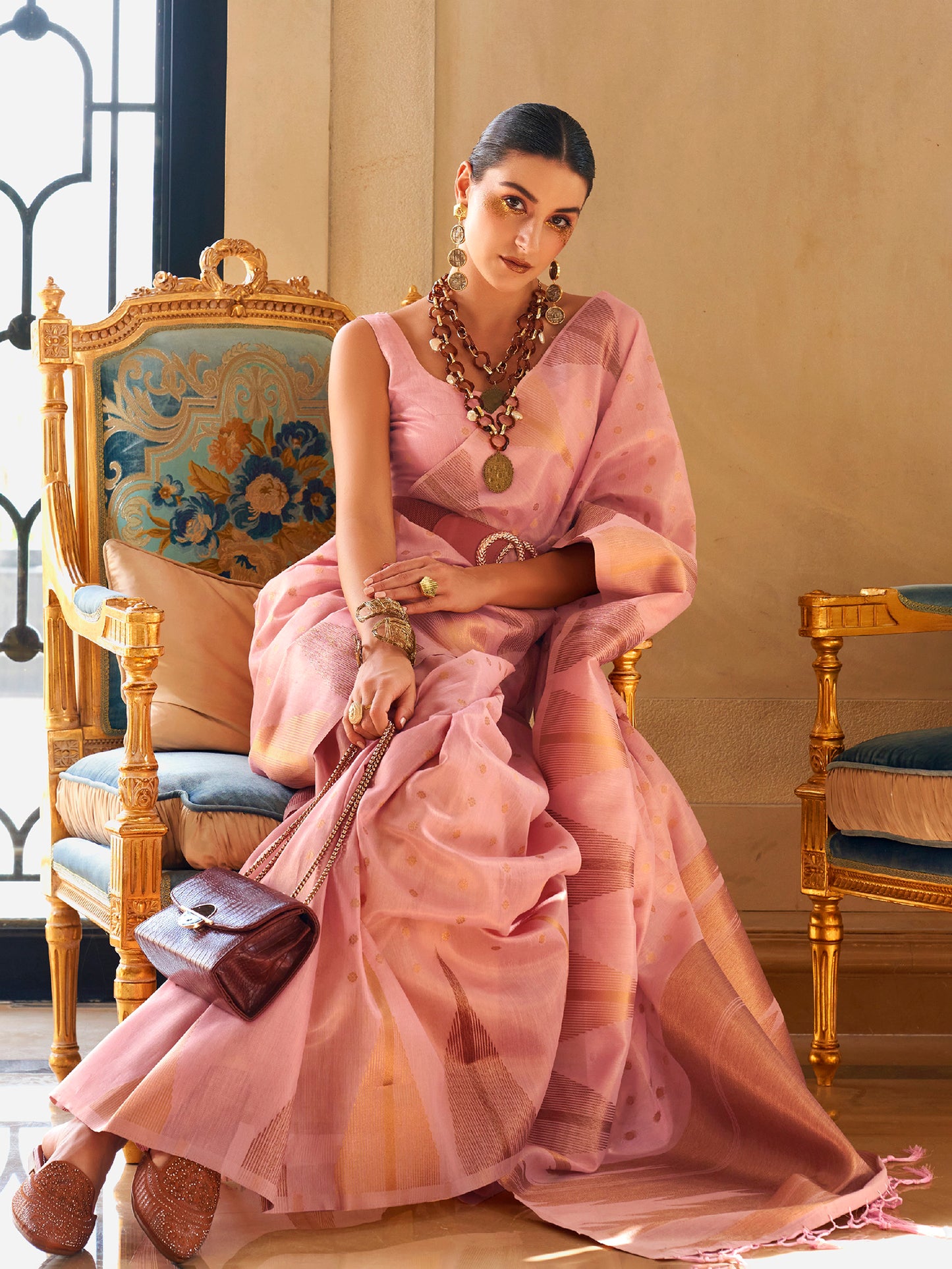 Women's Tissue Mauve Woven Design Designer Saree With Blouse Piece